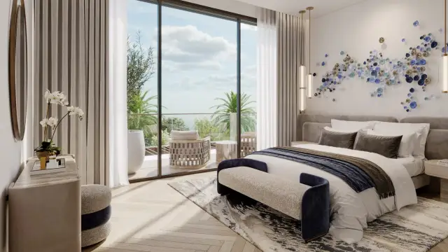 Bedroom with a full-height window onto the balcony